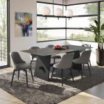 Concrete dining tables paired with round-backed dining chairs
